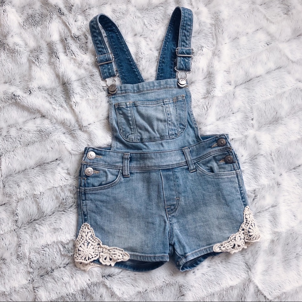 Denim overalls.